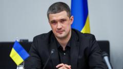 Former Ukrainian Defence Minister Advocates for Presidential Election Amid Ma.